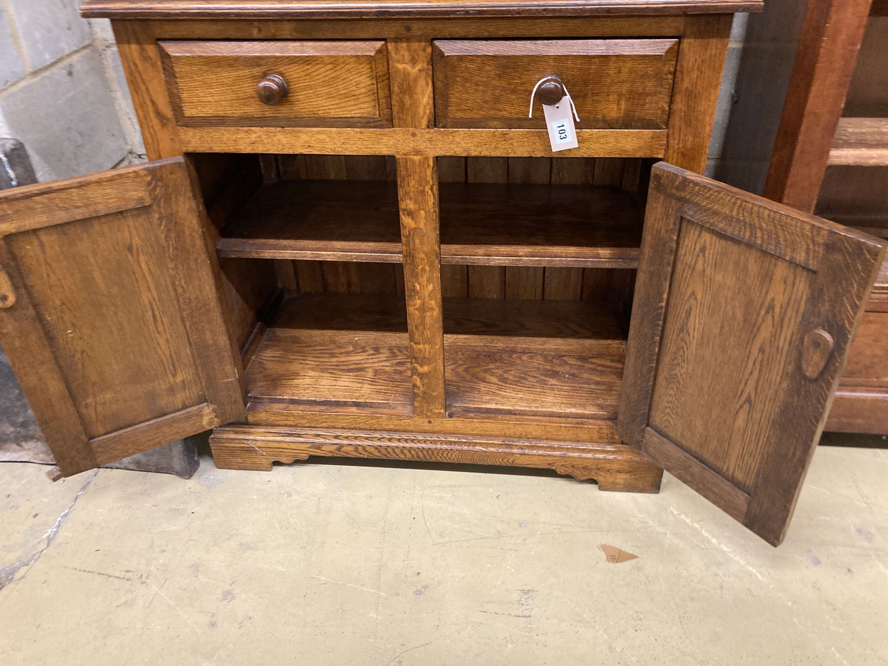 A small 18th century style narrow oak dresser, length 86cm, depth 43cm, height 187cm